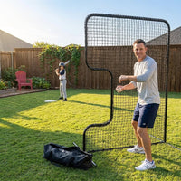 Standard C Shaped Pitching Screen Softball Baseball Screen Softball Pitcher Pitching Machine Protector with Carry Bag, 7'H X 5'W 45 Ply Netting with 3'' X 18'' Cutout 1.5'' Diameter Frame — Lifestyle